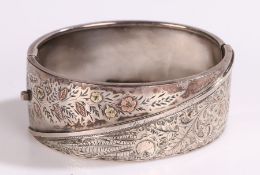 Silver bangle, with gilt foliate and scroll decoration, 30g