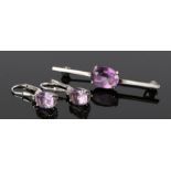 Silver and amethyst set jewellery, to include a pair of earrings and a bar brooch, (3)