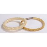 Ivory bangle with carved foliate decoration and white metal bar, ivory bangle with carved dragon