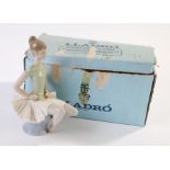 Lladro porcelain figure, ballerina seated on a footstool, 22.5cm high, with box
