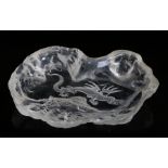 Art glass dish decorated with a dragon flying over a mountain, 16.5cm by 13cmChips to edges, surface