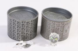 Two Swarovski figures depicting a duck and an owl, both housed in original packing tubes (2)