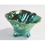 Zsolnay Hungary Jubileum 150 bowl, with green lustre decorated scrolled body, 11.5cm high, 20.5cm