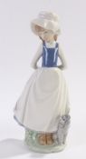 Nao porcelain figure, young girl and her dog, 23.5cm high