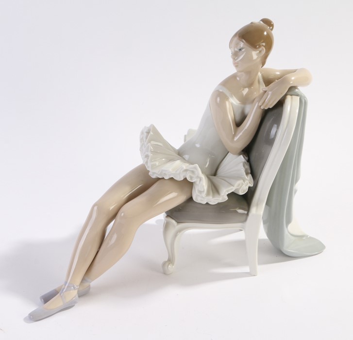 Lladro porcelain figure, ballerina seated on a chair, 24cm high