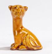 Watcombe Torquay pottery model of a stylised seated cat, stamp mark to the base, 7cm high