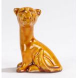 Watcombe Torquay pottery model of a stylised seated cat, stamp mark to the base, 7cm high