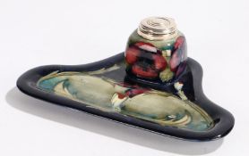Moorcroft pottery desk stand, pansy pattern with an inkwell to the read and pen tray to the front,