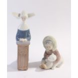 Two Lladro porcelain figures, nun kneeling in prayer, 22cm high, inuit child with polar bear, 12cm