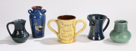 Collection of Torquay ware, to include an owl jug, an Upchurch vase, a twin handled cup, jug and a