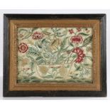 Early 18th Century embroidery and stump work panel, circa 1700, the centre with a basket of