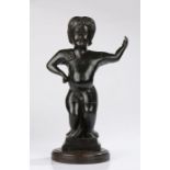 George III counter top figure, carved in pine and stained black with a nude figure holding an arm