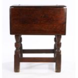 Mid 17th Century oak table stool circa 1650 – 1660. the three-plank hinged top supported on