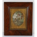 Early 19th Century silk work, boy and dog playing with a ball, housed within a rosewood frame,