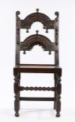 Charles II Oak Derbyshire chair, circa 1660 – 1680. with twin arcaded back panel carved with reverse