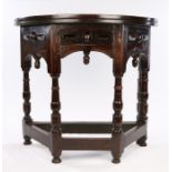 Small mid 17th Century oak and fruitwood Credence table, English, circa 1650 – 1670, the folding top