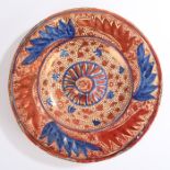 17th Century Hispano Moresque dish, the raised central boss with a central bird, stylised flower and