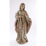 17th Century carved figure of a saint, standing with flowing robes with traces of the original