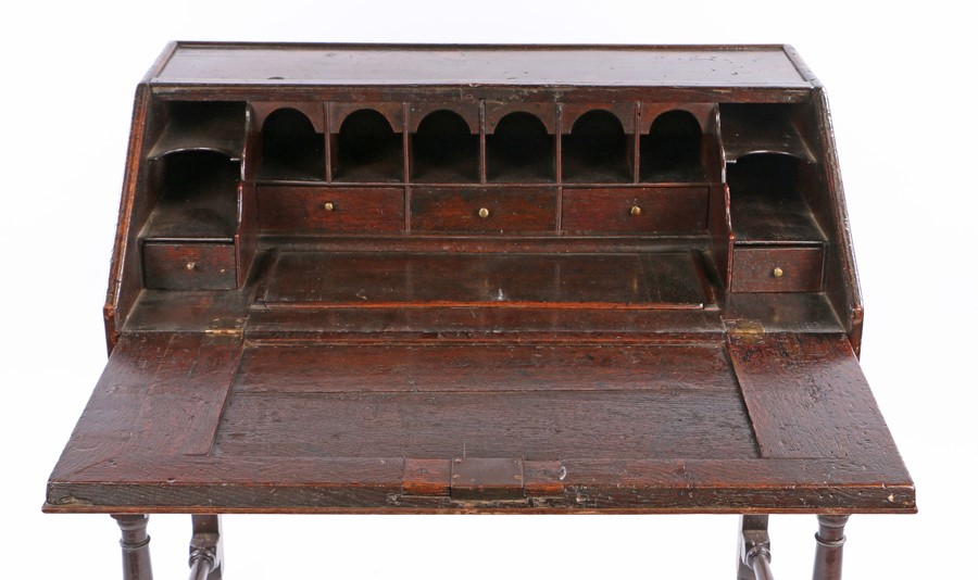 William and Mary / Queen Anne oak desk on stand, English, circa 1690 – 1710. the fall front sloped - Image 2 of 2