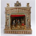 Late 19th Century toy theatre, with a backdrop and curtained front, figures attached to metal rods