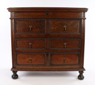 Rare Charles II oak lift top chest of drawers, English, circa 1680. the hinged plank lid lifting