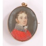 George III miniature portrait, of an officer in a red military tunic, the reverse with initials