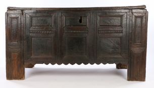 16th Century oak Flemish coffer, of large proportions, the panel top with moulded edge above the