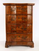 17th Century Italian walnut chest of drawers, circa 1700, the angled serpentine front with a row