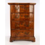 17th Century Italian walnut chest of drawers, circa 1700, the angled serpentine front with a row