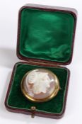19th Century carved hardstone cameo brooch, depicting Athena with a circular yellow metal mount,
