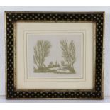 Early 19th Century cut paper picture of a landscape, in olive green paper with a town between tall