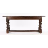 Charles I oak ‘H’ stretcher bench, English, circa 1630-1640. The plank top bench with plain frieze