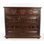 Charles II oak chest of drawers, English circa 1680. with plank top above graduated sets of