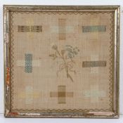 George III darning sampler, early 19th Century, with eight crossed bands of varying colours and a