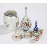 Chinese porcelain, to include a 19th Century large export ware armorial barrel jug, 20cm high, three