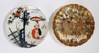 Two Japanese porcelain plates, the first a Satsuma example with figures around a horse AF, 30cm