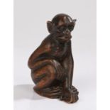 Chinese carved monkey, the wooden monkey in seated position, 12cm high