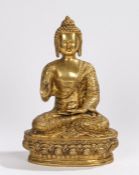 Gilded bronze figure depicting Buddha, depicted in a seated position with legs crossed, 32cm