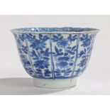 Chinese porcelain tea bowl, Jiaqing period, decorated with panels of flowers in blue and white,