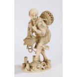 Japanese ivory okimono, Meiji period, of a fisherman and stalk, character mark to the base, 13.5cm