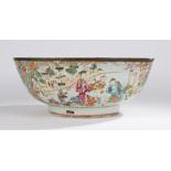 Large Chinese porcelain punch bowl, Qianlong period, depicting figures at leisure drinking tea