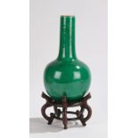 Chinese porcelain monochrome vase, Qing Dynasty, in a vibrant green crackle glaze, with a long