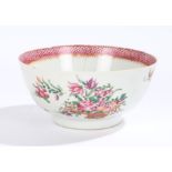 Chinese porcelain bowl, Qianlong, with a red border lip above foliate decoration, 14.5cm wide