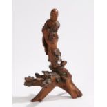 Chinese root wood carving, Qing Dynasty, with a figure standing above the root base, 36cm high