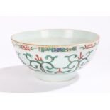 Chinese porcelain bowl, Kangxi, with a central flower to the middle, the exterior with green swags