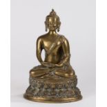 Chinese gilt bronze buddha, Qing dynasty, seated position with arms in lap above the shaped plinth