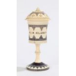 19th Century Indian ivory pommander, with black geometric decoration and a name to the front, 10cm