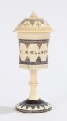 19th Century Indian ivory pommander, with black geometric decoration and a name to the front, 10cm