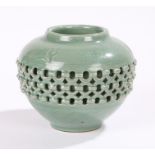 Chinese Celadon vase, with crackle glaze and impressed decoration above the blind fret bulbous body,