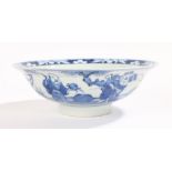 Chinese porcelain bowl, blue and white glaze with figures to the exterior and a landscape to the